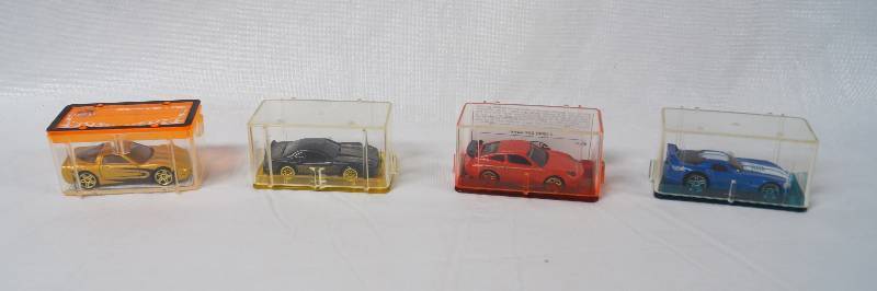 lot 2383 image: Lot of 4 Miniature Race Cars w Cases- Check it Out