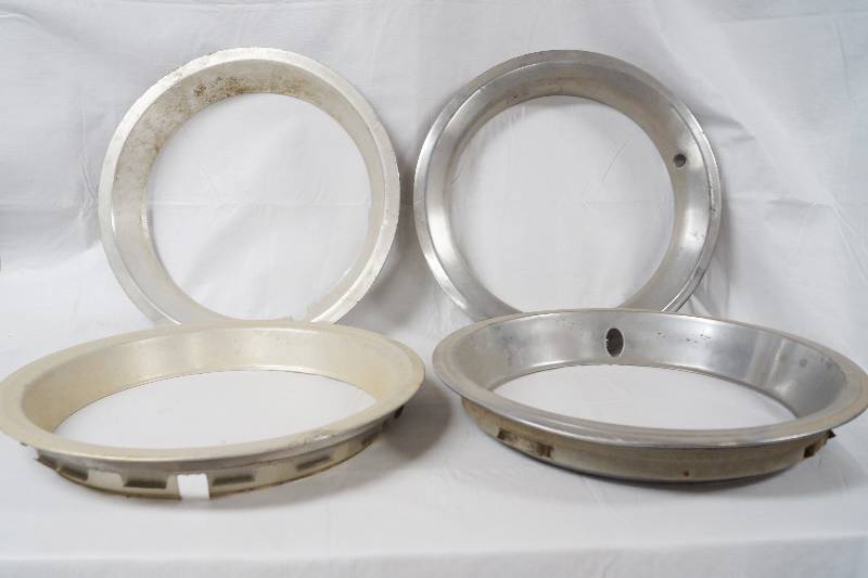 lot 3036 image: Lot of 4 Rim Covers- Check it Out