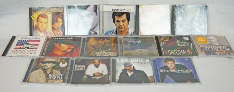 lot 3254 image: Lot of Assorted CDs - Lee Brice, Steve Holy, and More