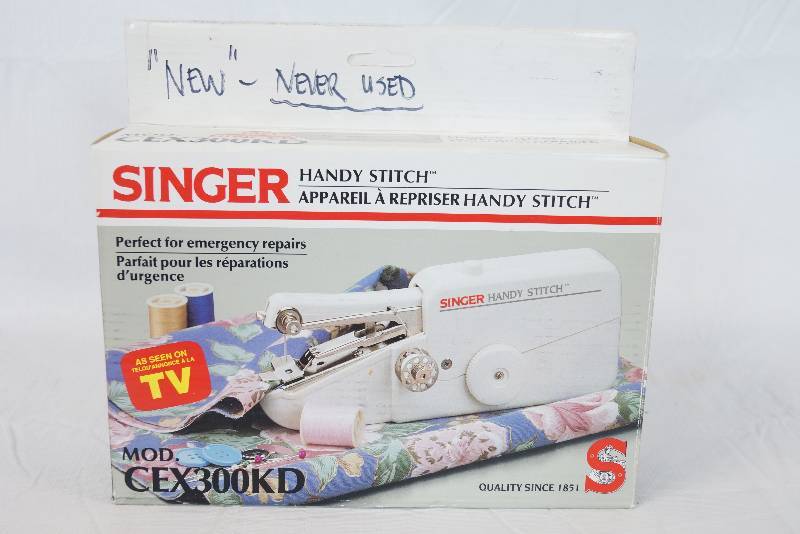 lot 3298 image: SINGER HANDY STITCH - MOD# CEX300KD - New in Box Battery Operated, Hand Held Sewing Machine