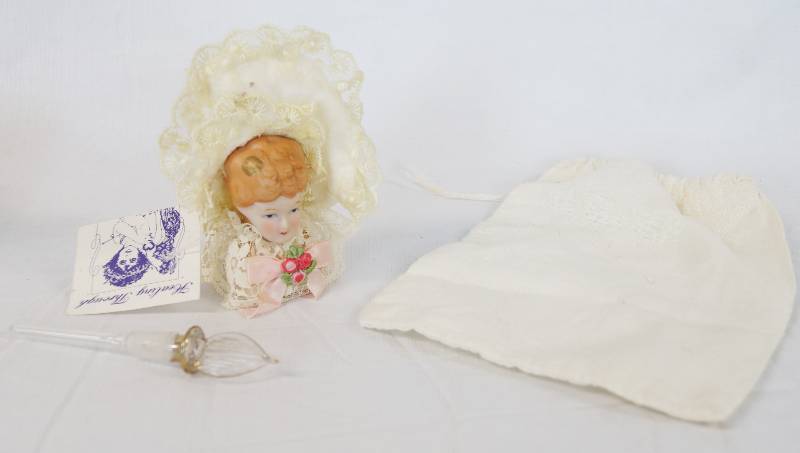 lot 3300 image: Old Porcelain Lady Ornament, Vintage Perfume Bottle Lid Rimmed with Gold - Muslin Material Bag - see pics