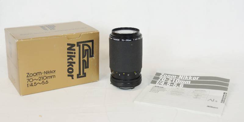 lot 3313 image: Nikkor F Zoom Lens 70-210mm - f4.5-5.6 w original box and book WOW