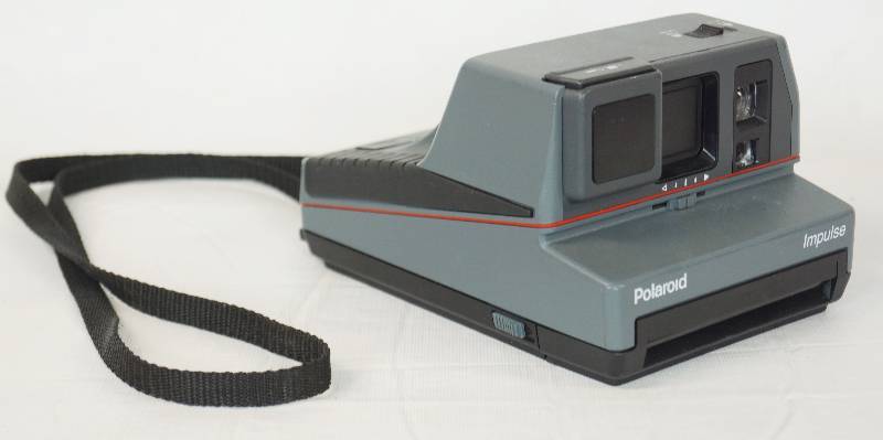 lot 3314 image: Vintage POLAROID Camera M# IMPULSE - Neato