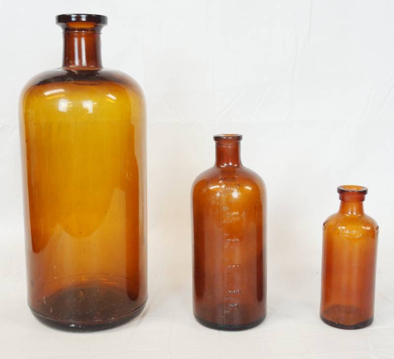 lot 3328 image: Lot of 3 Vintage Apothecary Brown Glass Bottles - BIG, Medium and small - Small is Lysol See pics for markings - COOL