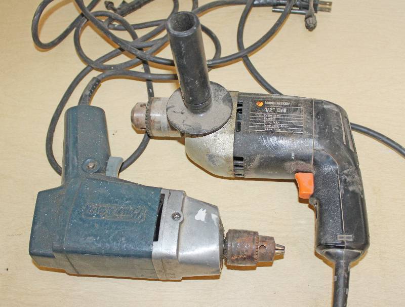 lot 9307 image: Two Electric Drills - One Black and Decker 12 - Other is Powercraft