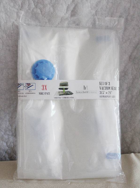 lot 9406 image: Set of 3Vaccum Seal Storage Bags - Approximately 31 12 x 24