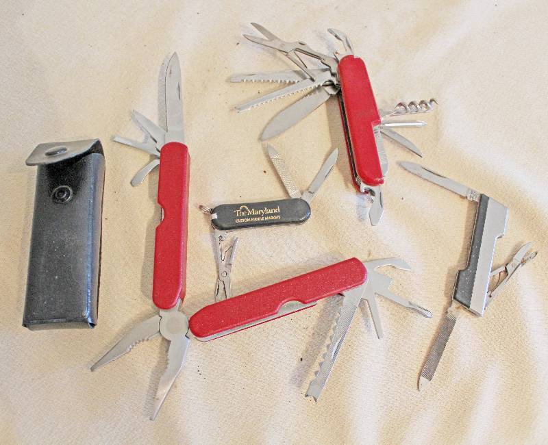 lot 9453 image: Lot of Five Pieces Multi-Tool Knives Set - Little bit of Everything Boyscouts are jealous