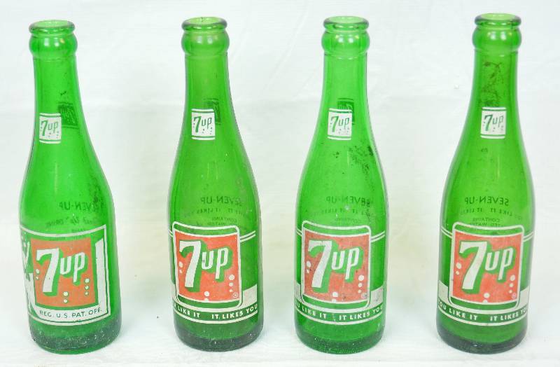 lot 1045 image: Lot of 4 Vintage 7-Up Bottles - Neat Dark Green Glass