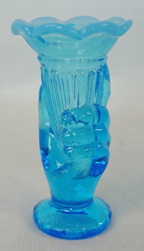 lot 1163 image: Vintage Blue Glass Hand Holding Torch - Believed to be Fenton - Statue of Liberty Inspired