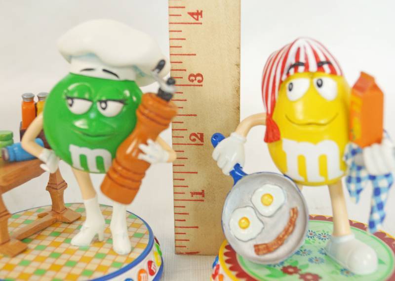 lot 1193 image: Just add Spice and Sunny Side Up M&M Sweet Treats Figurines - Danbury Mint - Highly Collectible