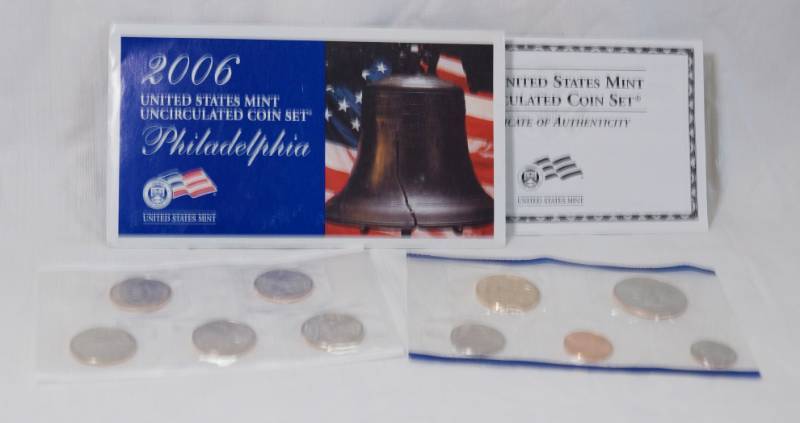 lot 1235 image: 2005 - Uncirculated Coin Set US Mint - 5 Quarters and Regular Coins - Philadelphia Mint Marks - Sealed - with Original Envelope w papers