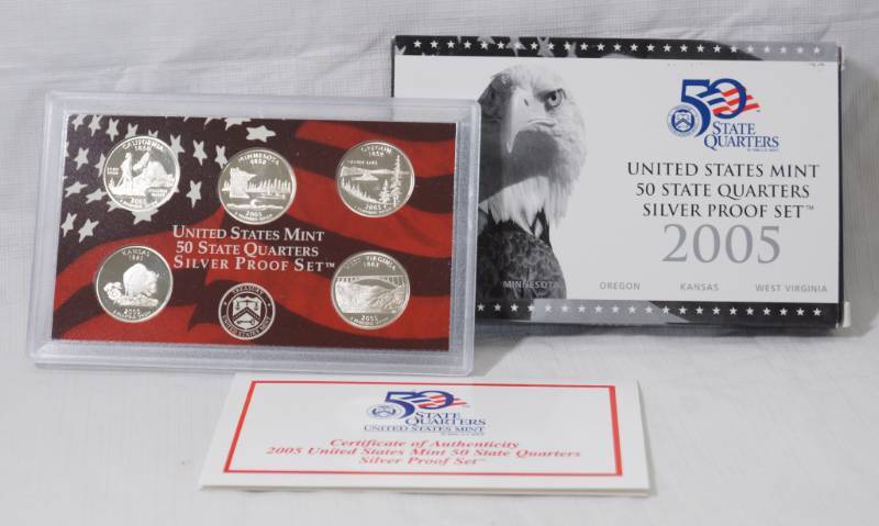 lot 1293 image: 2005 - United States Mint 50 State Quarters Silver Proof Set - Includes 5 Quarters - California, Minnesota, Oregon, Kansas, West Virginia - Sealed in Plastic Case - w box and papers