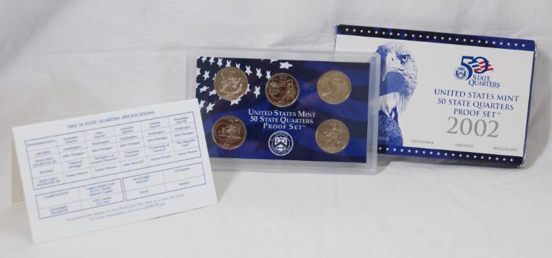 lot 1306 image: 2002 - United States Mint 50 State Quarters Silver Proof Set - Includes 5 Quarters - Tennessee, Ohio, Louisiana, Indiana, Mississippi - Sealed in Plastic Case - w box and papers