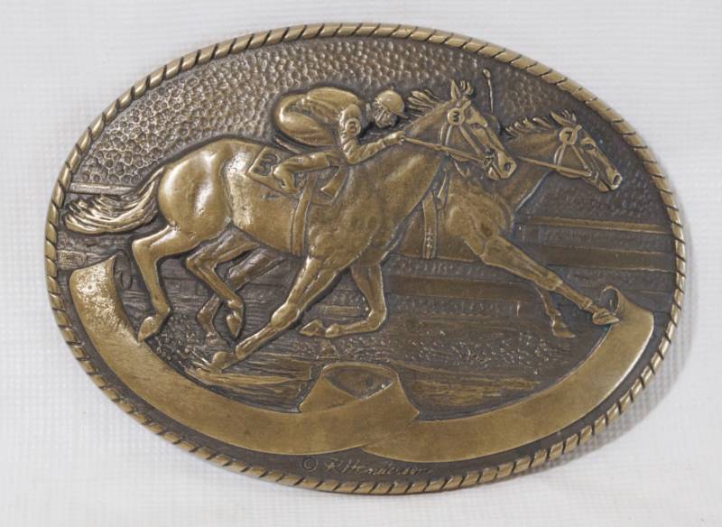 lot 1342 image: Race Horse Brass Belt Buckle - Tony Lama - No. 7616