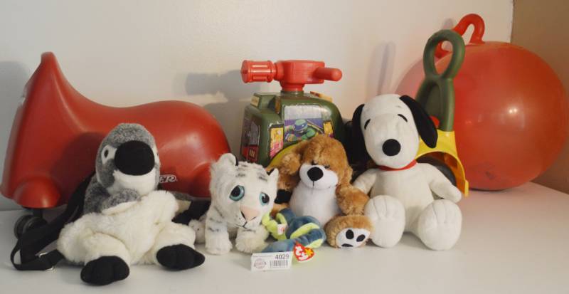 lot 4029 image: Toddler Ride on Toys and stuffed animals