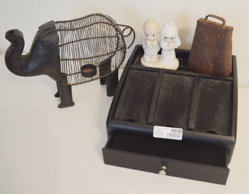 lot 4038 image: Charging station, Precious Moments Wedding Figurine E3114, Antique Cow bell, Elephant tea light candle holder