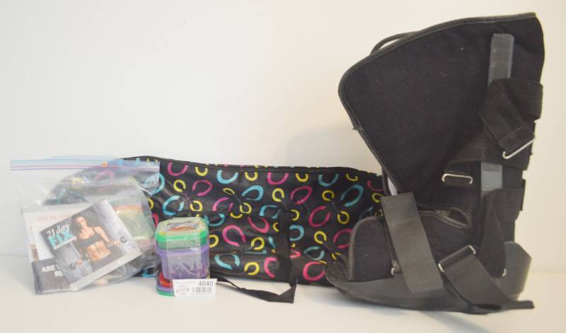 lot 4040 image: 21 Day Fix Extreme workout program, nutrition containers, yoga mat bag and walking boot size Large, Under desk stationary bike