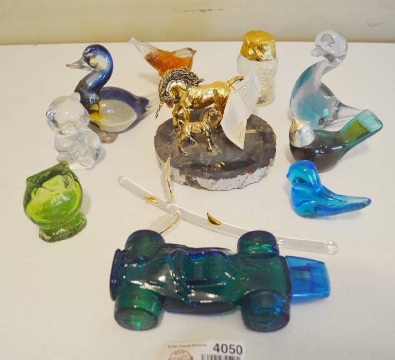 lot 4050 image: Lot of Misc. Glass Decor, 3 Avon Perfume Cologne Bottle, and Lead Crystal Unicorn Sculpture.