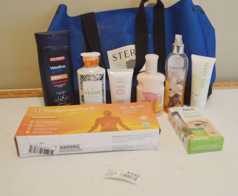 lot 4102 image: Bag of Misc, Lotions, Soap and Instant Heat Pack