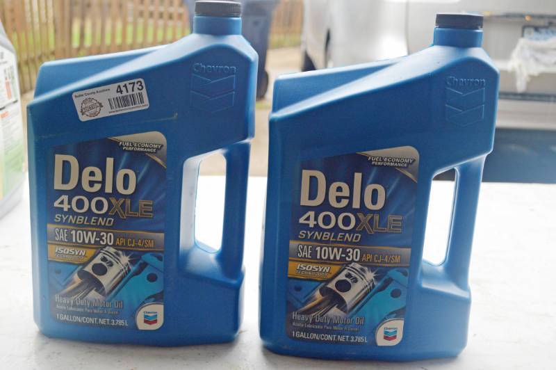 lot 4173 image: 2 New Bottles Delo 400 XLE Syn Blend 10W30