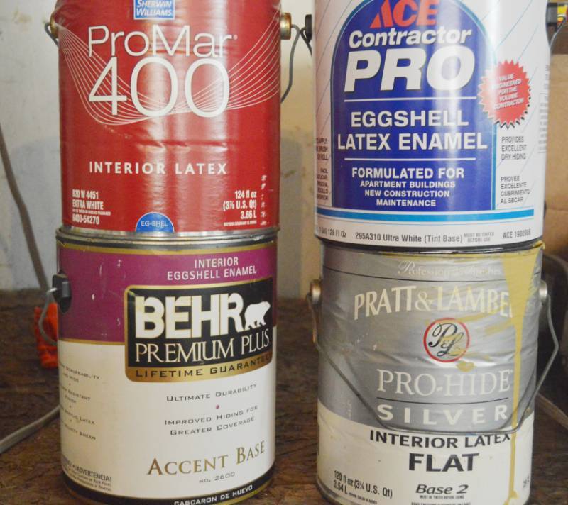lot 4192 image: 4 Cans of Paint. 2 Partial and 2 Appear Full. Different Colors.