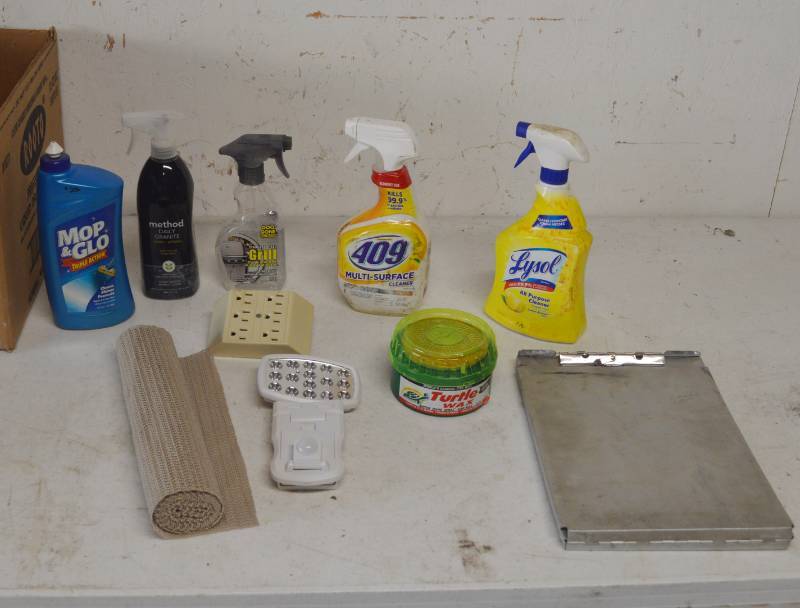 lot 4245 image: Misc Household cleaner, Shelf Liner, Light, Clipboard.