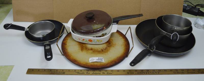 lot 4324 image: Pampered Chef Pizza Stone and Misc. Pots and Pans
