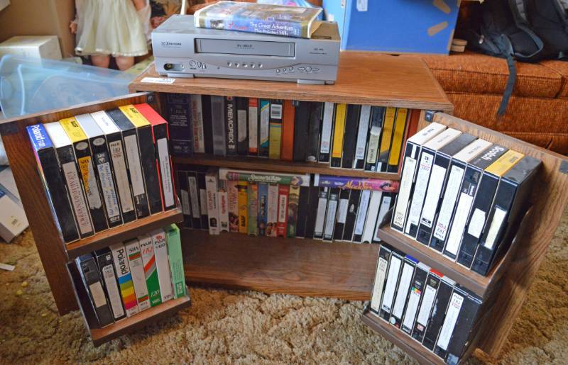 lot 4331 image: Emerson VHS Player and VHS Cabinet w Large Lot Misc. VHS Tapes 24.5 T x 22.5 W x 12 D