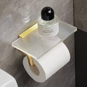 lot 2464 image: Toilet Paper Holder with Shelf Bathroom Toilet Paper Roll Stand Wall Mounted Tissue Storage Holder for Kitchen with Acrylic, No Drill Tissue Holder with Mobile Phone Storage Rack (Gold)