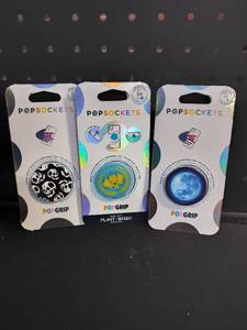 lot 8340 image: PopSockets PopGrip Phone Holders Bundle - Skull, Pickleball, and Moon Designs