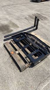 lot 10 image: Unused Skid Steer Forklift Fork Extensions with Mounting Frame Attachment