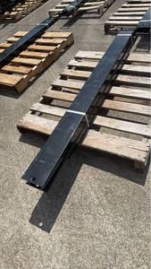 lot 48 image: 1 Set of 6 Forklift Extensions Black Steel Fork Tine Extensions