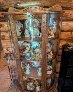 lot 501 image: Oak Curved Glass Curio Display Cabinet with Carved Leaf Design