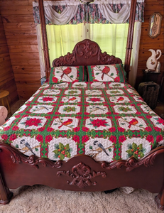 lot 503 image: Christmas Cardinal and Poinsettia Quilted Bedding Set with Matching Shams
