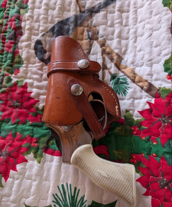 lot 510 image: Leather Holster with .22 Caliber Ammunition