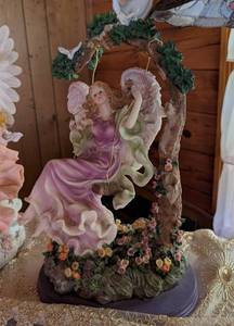 lot 513 image: Decorative Angel Garden Swing Figurine with Floral Base