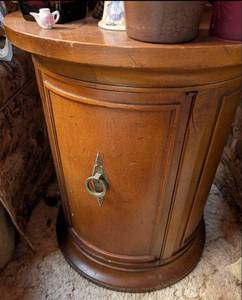lot 570 image: Round Wooden End Table with Metal Pull Handle