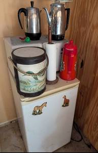 lot 594 image: Mini Refrigerator with Animal Magnets and Coffee Station