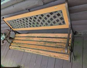 lot 634 image: Wood & Wrought Iron Porch Bench with Lattice Panel