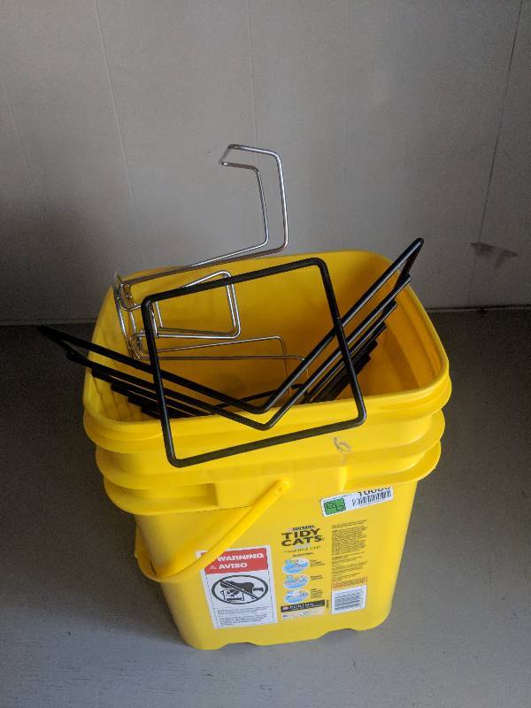 lot 10066 image: bucket with wire cooking racks