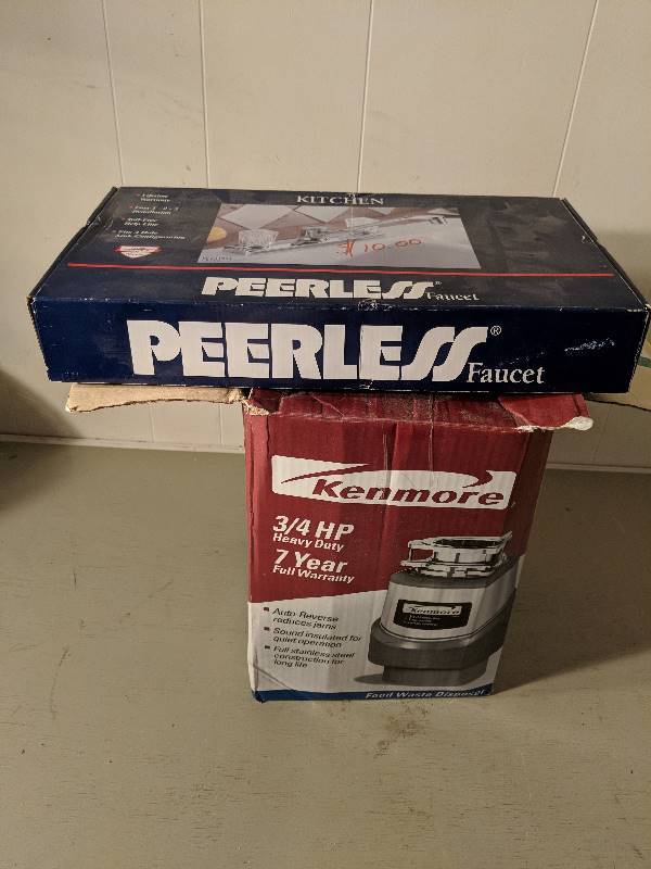 lot 10119 image: Kitchen faucet and garbage disposal