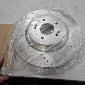 lot 9944 image: New Drilled and Slotted Brake Rotor