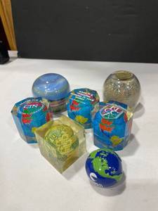 lot 1070 image: Salt Lake City and globe paperweights