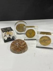 lot 1073 image: Coins and medallions in acrylic paperweights