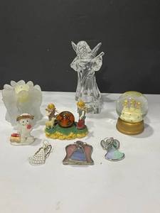lot 1089 image: Mikasa and other angel decor