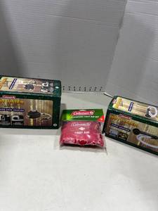 lot 1142 image: Coleman water hose adapter, spray adapter and first aid kit