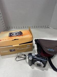 lot 1183 image: Canon power shot digital camera with case