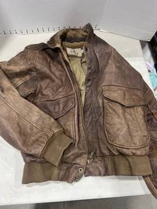 lot 1193 image: New Order leather coat size S