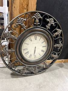 lot 1194 image: Madison clock company tin wall clock 38 inches in diameter