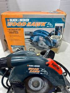 lot 1205 image: Black and Decker wood hawk